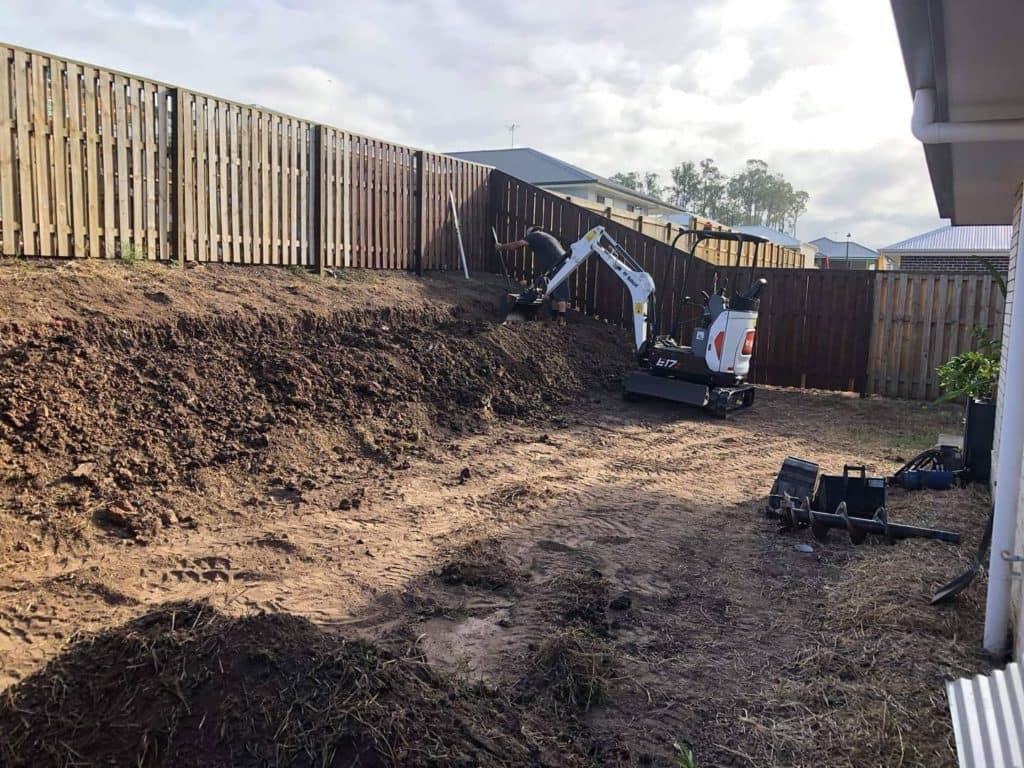 Steel Posts in Concrete Footings: A Foundation for Landscape Transformation in Forest Lake