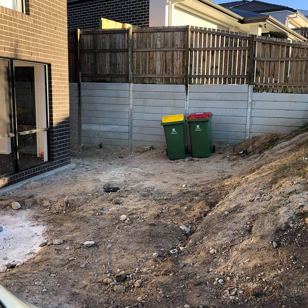 Double tier retaining wall and steps.