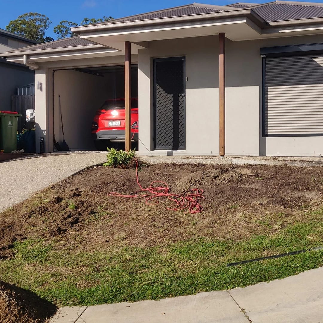 concrete retaining wall build and removed the front yard slope