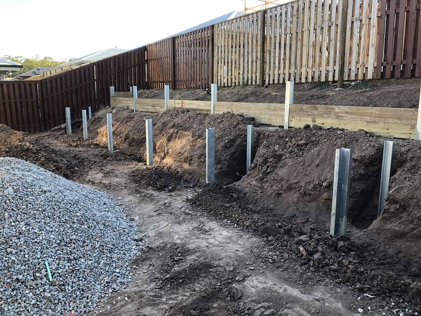 Steel Posts in Concrete Footings: A Foundation for Landscape Transformation in Forest Lake