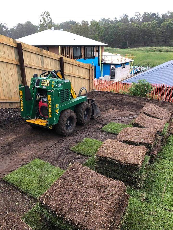 Spreading and leveling topsoil before laying the turf 22-02-2018