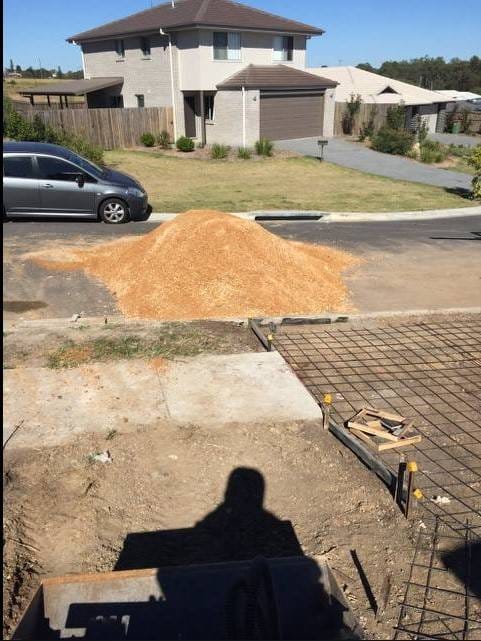 Elevated and leveled this houses surroundings in preparation for astro turf with a neat deep edge for garden installation