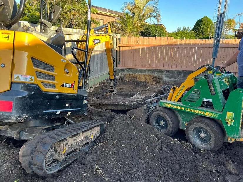 Big old concrete footing in the way. Lucky for @kangaloaders and @yello equipment 02