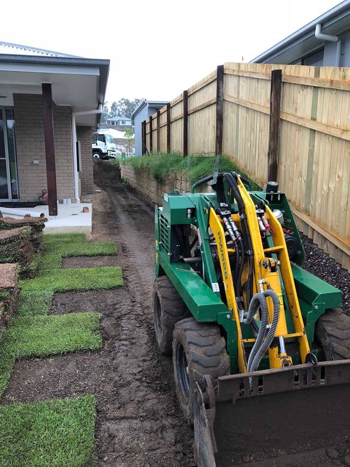 Spreading and leveling topsoil before laying the turf 22 02 2018