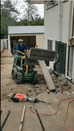 Small machine incredible power. Our Kanga is so versatile it made this solid concrete coloum with 4 Rio bars come down with ease 04