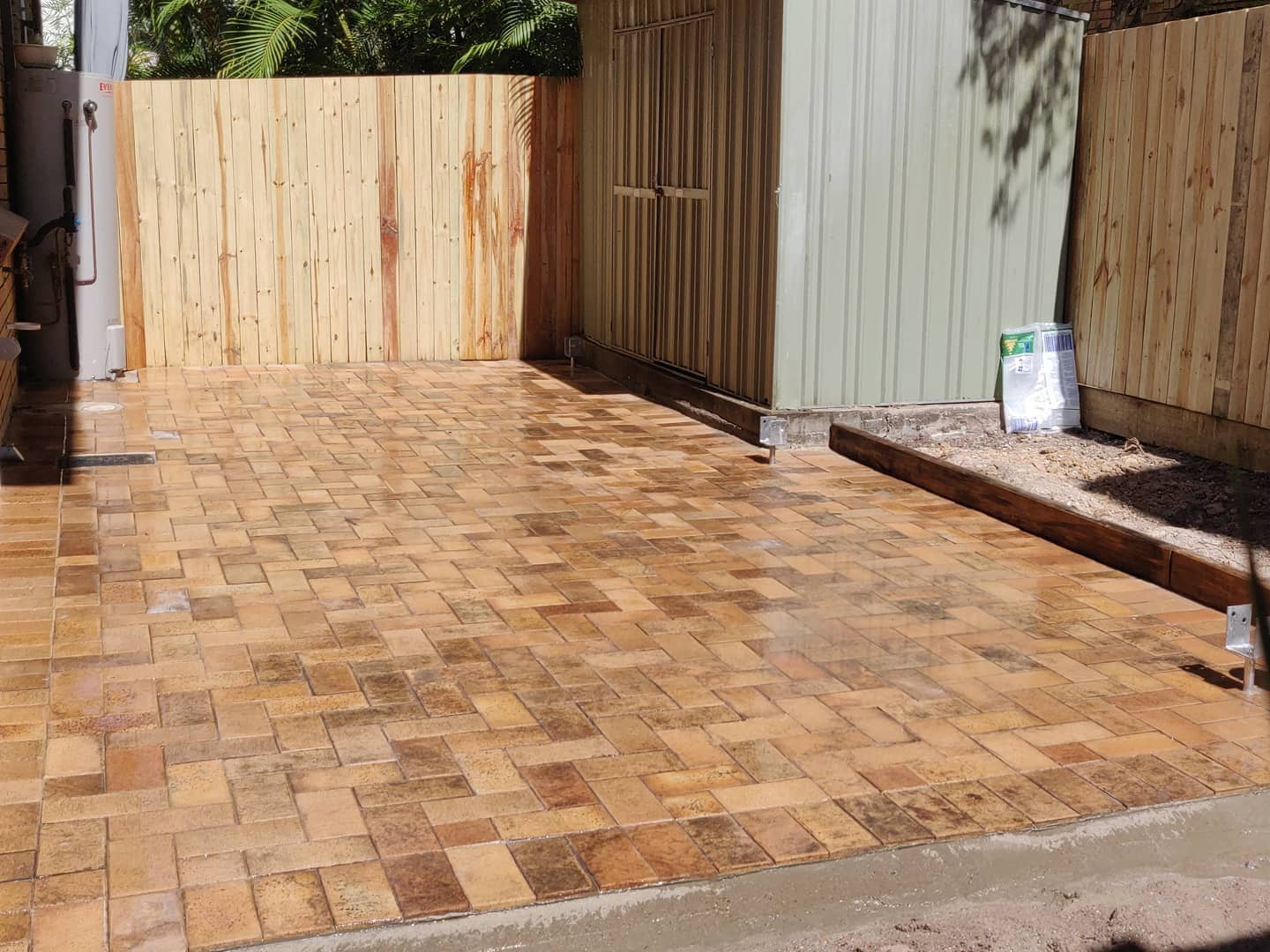 Courtyard paving and boundary fencing in East Brisbane 