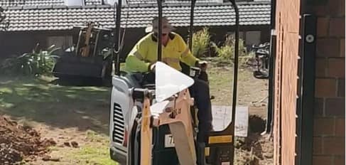 Ian and the excavator in action on our latest retaining project