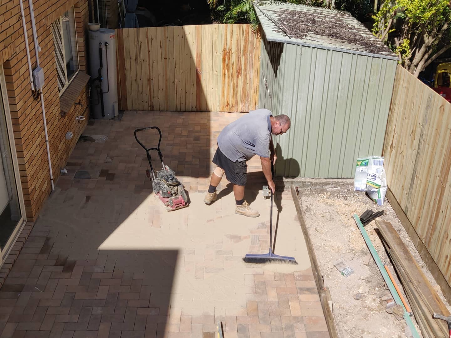 Courtyard paving and boundary fencing in East Brisbane  