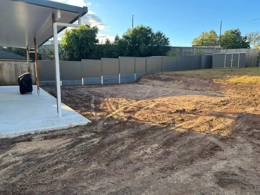 This resident had a sloping backyard right to there patio they wanted to extend their entertaining area and have room for a shed