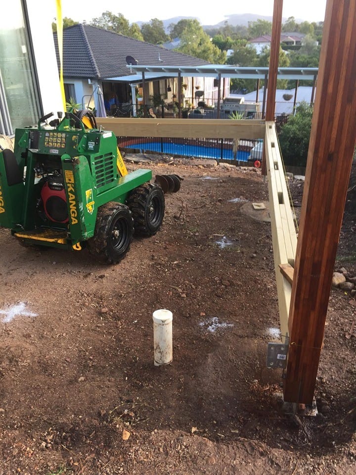Quick and easy, a bunch of footings dug for the deck in progress