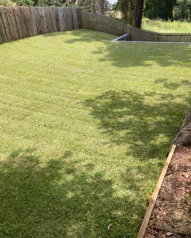 Block retaining wall, backyard level and turf