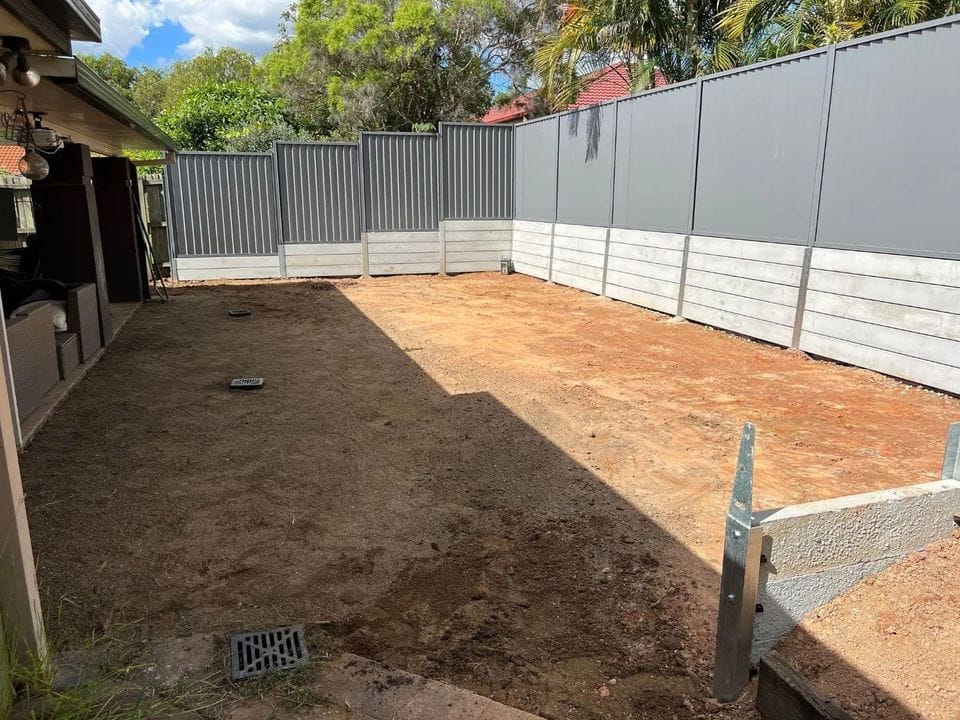 large-dig-out-concrete-retaining-wall-and-colourbond-fencing-rogers